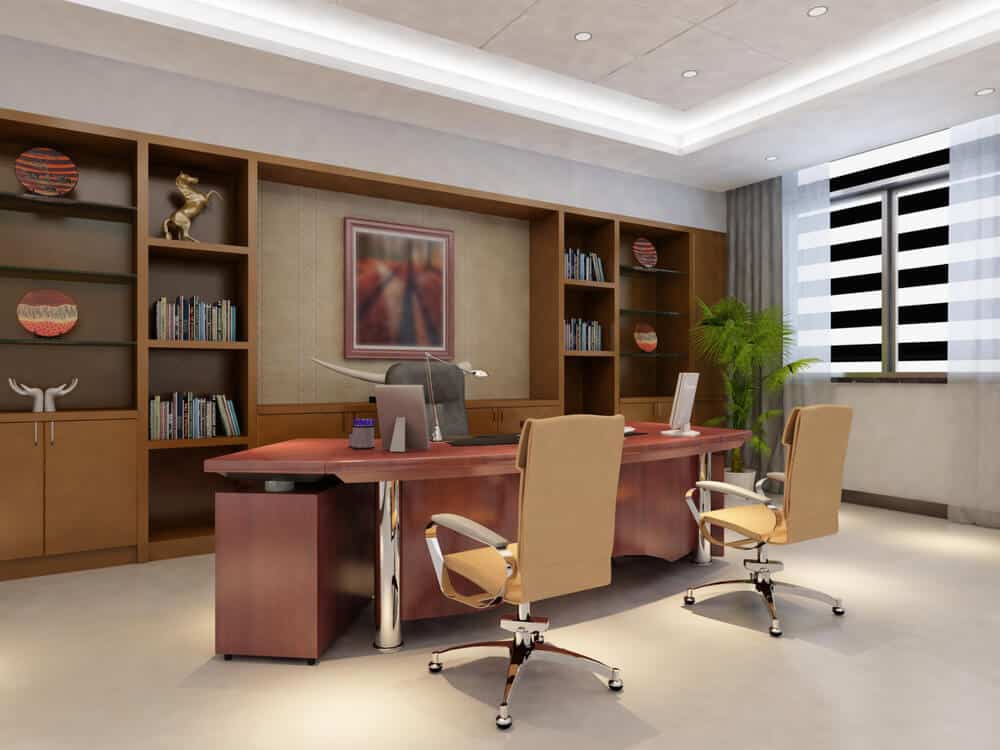 A finished office with a desk, shelving and freshly painted walls