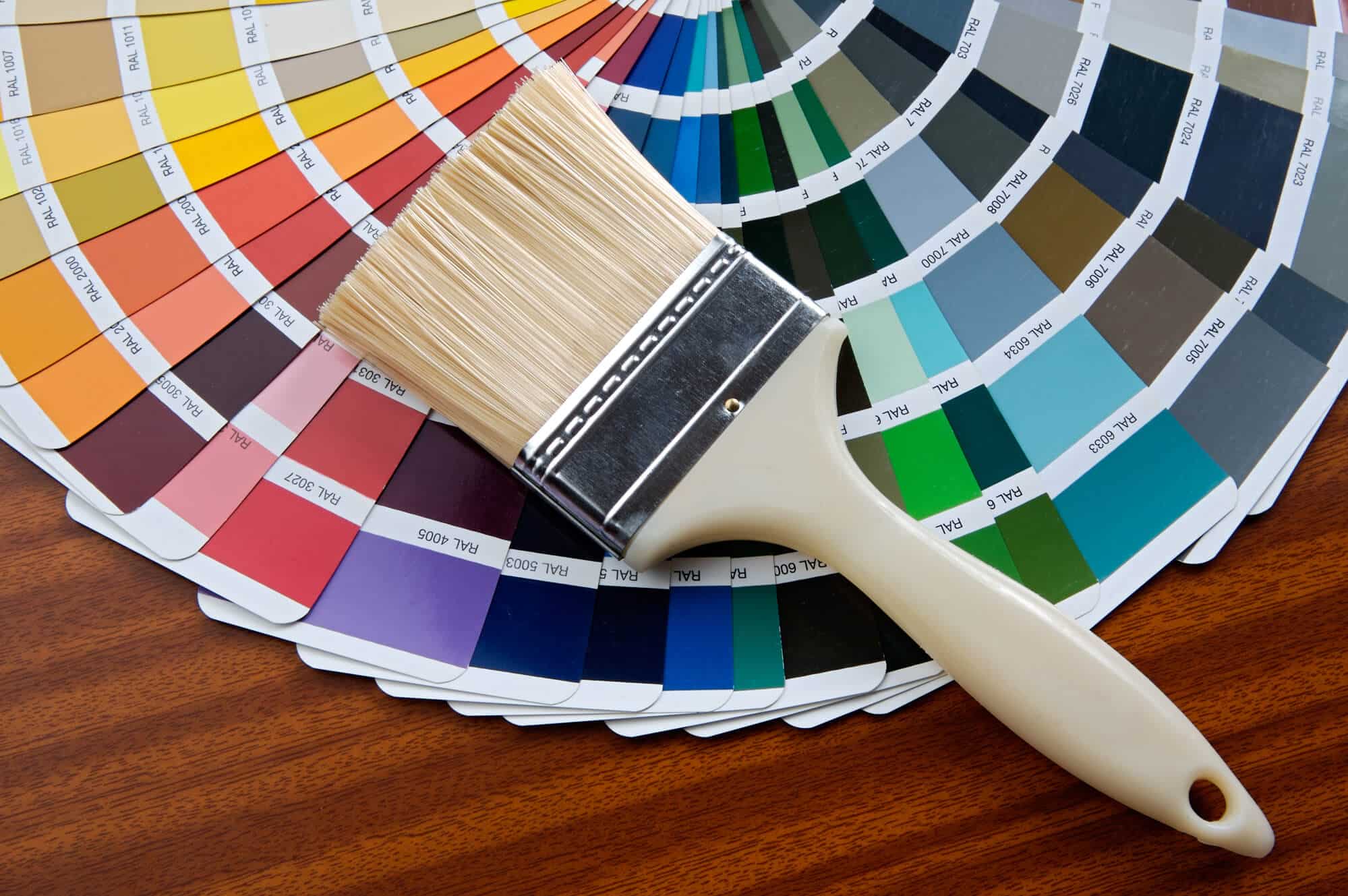 A wide fan of paint color swatches
